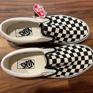 Classic black and white checker slip on Vans.